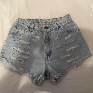 Vintage Levi’s, light wash, ripped, medium rise shorts